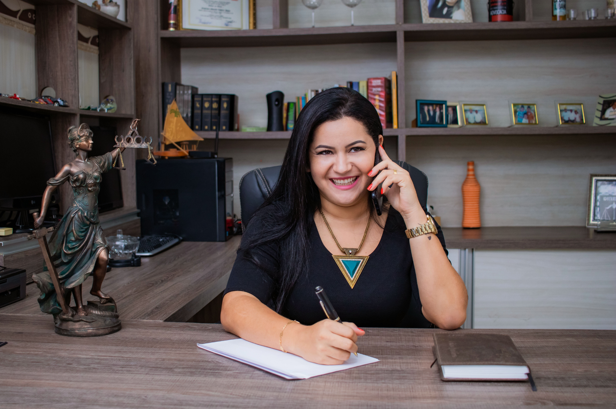 Professional receptionist providing client support at an ASuperior office desk